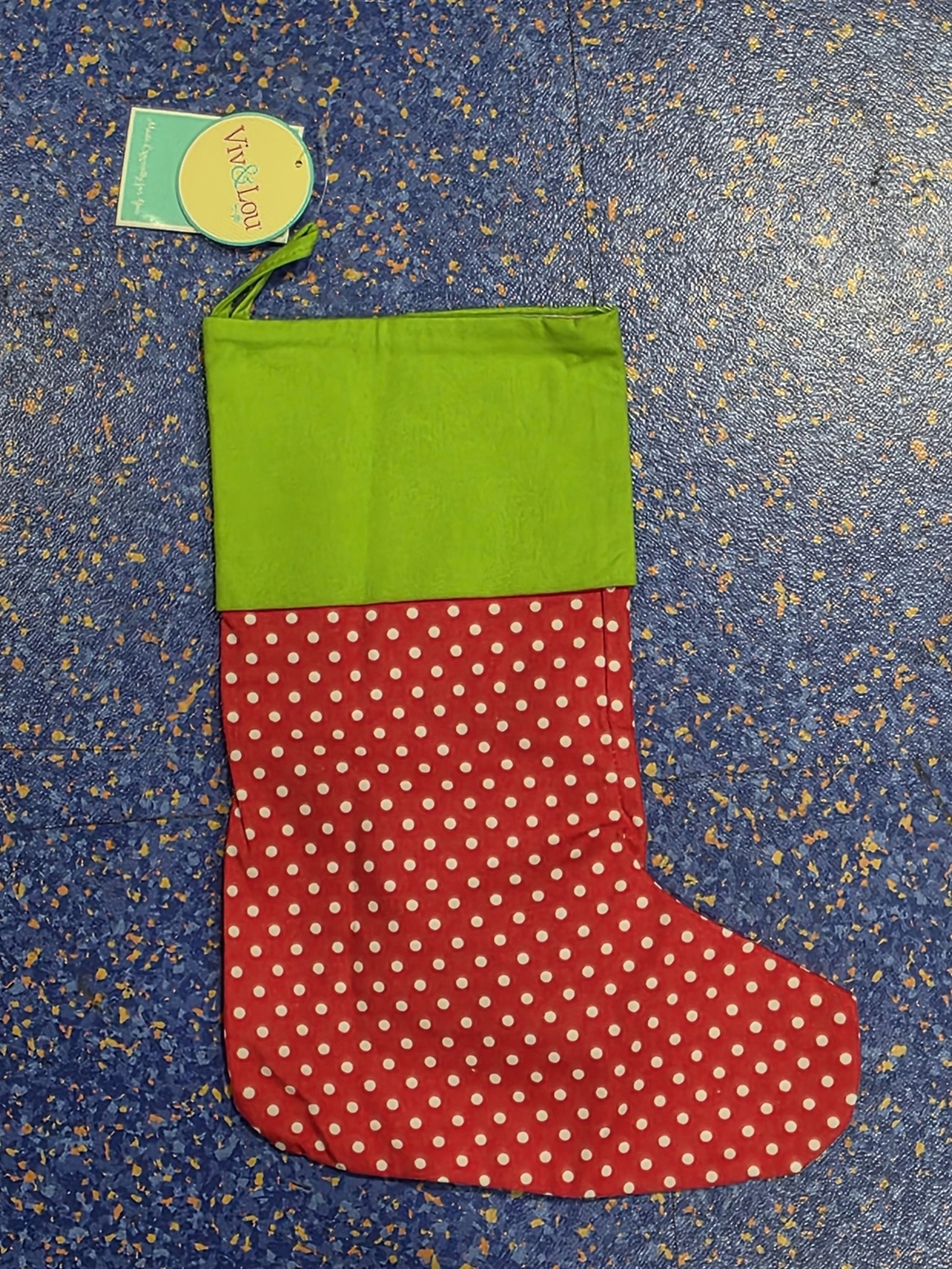 Red Polka Dot Christmas Stocking with Green Cuff 16 Inches Tall.